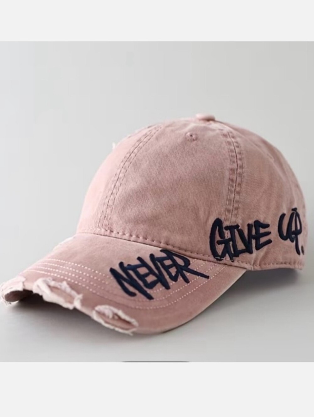 Pink Distressed Hat with Motivational Text "Never Give Up"